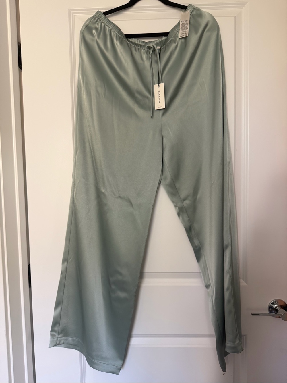 Archer Satin Pant 

https://www.aritzia.com/us/en/product/Archer%20Satin%20Pant/